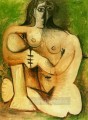 Femme nue accroupie sur fond vert 1960 Desnudo abstracto
